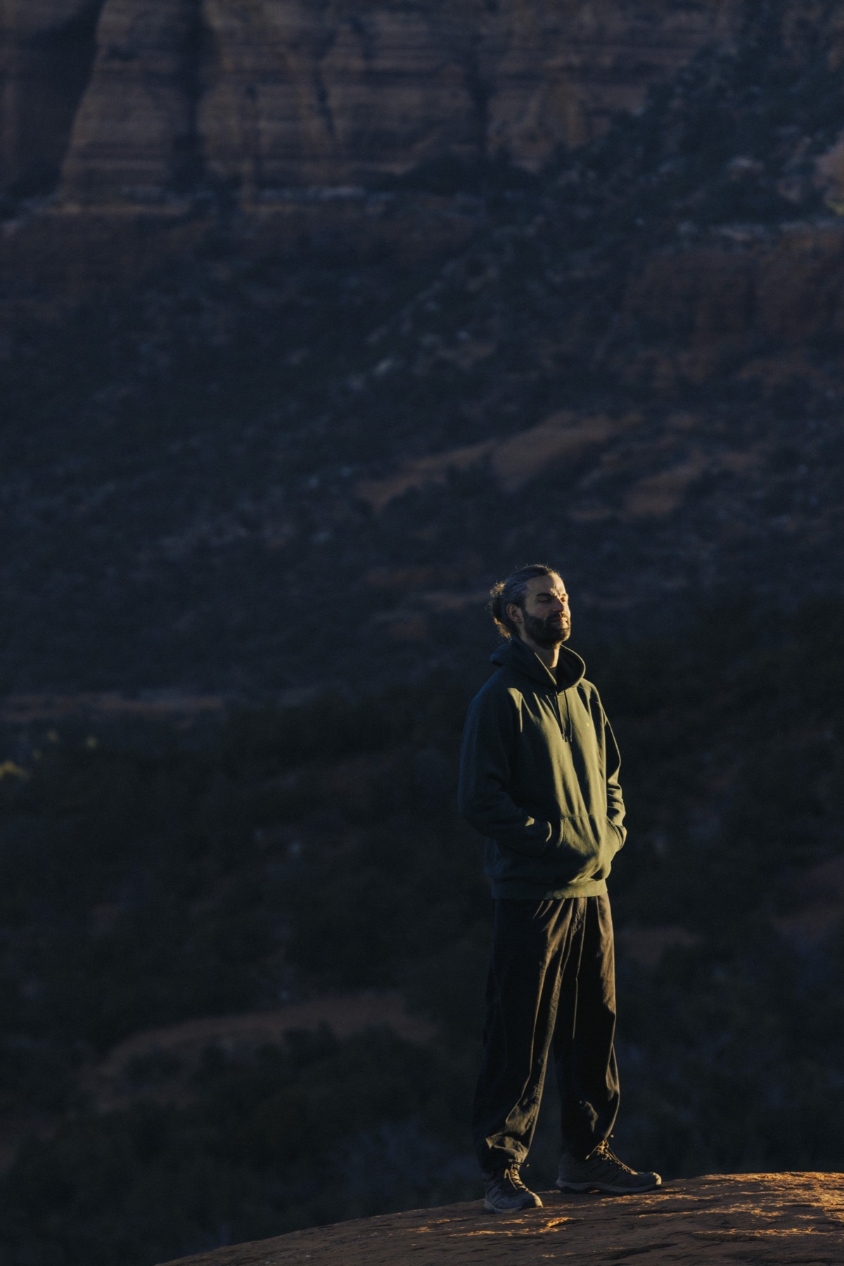 Matt Gray standing on a ridge at first light
